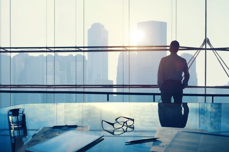 Businessman in a big office